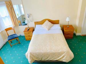 Postel nebo postele na pokoji v ubytování Redclyffe Guesthouse