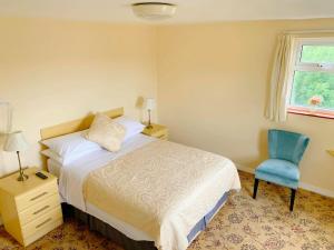 Кровать или кровати в номере Redclyffe Guesthouse