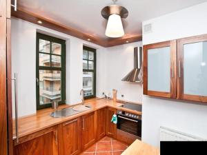 Kuchyňa alebo kuchynka v ubytovaní Apartament Haffnera 10