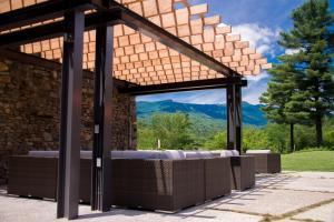 a pavilion with a view of the mountains at Topnotch Resort in Stowe