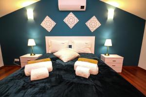 Ένα ή περισσότερα κρεβάτια σε δωμάτιο στο LUXURY APARTMENT - T1 vue sur piscine - PRAIA DA LUZ +15 φωτογραφίες