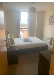 A bed or beds in a room at City Apartments Milton Keynes 