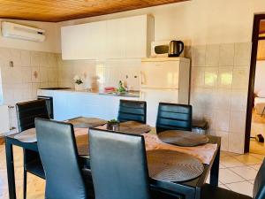 Kuchyň nebo kuchyňský kout v ubytování Apartment Meri