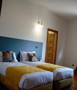 Postel nebo postele na pokoji v ubytování B&B La Casa di Sirio