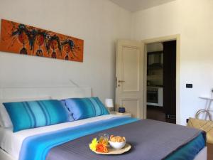 Posteľ alebo postele v izbe v ubytovaní La casa di Giulia Apartment with air conditioning, wifi and private parking