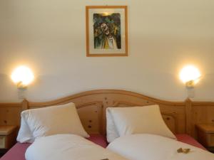 Voodi või voodid majutusasutuse Hotel Preda Kulm toas