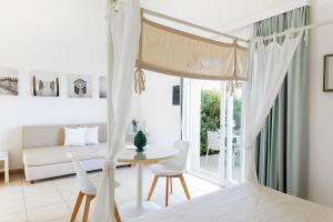מיטה או מיטות בחדר ב-Tonnara di Sciacca