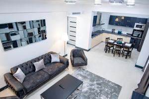 O zonă de relaxare la Enjoy Life Apartments
