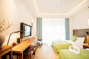 TV o dispositivi per l'intrattenimento presso Jinling Onejoy Hotel