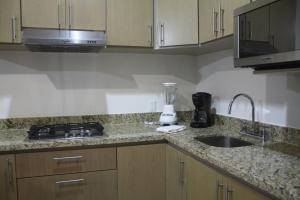Una cocina o zona de cocina en MARENA Suites & Apartments