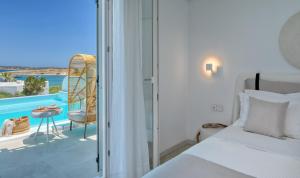 Posteľ alebo postele v izbe v ubytovaní Lilly Residence-All Sea View Suites, Adults Only