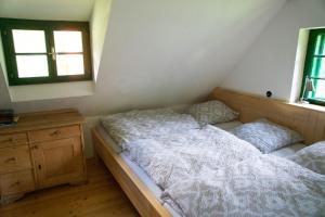 Postel nebo postele na pokoji v ubytování STEYR RIVER LODGE