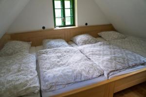 Postel nebo postele na pokoji v ubytování STEYR RIVER LODGE