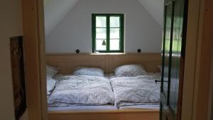 Postel nebo postele na pokoji v ubytování STEYR RIVER LODGE