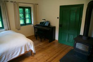 Postel nebo postele na pokoji v ubytování STEYR RIVER LODGE