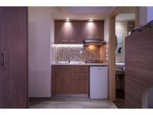 Kuchyň nebo kuchyňský kout v ubytování House Diakos Toroni + 29 fotografií