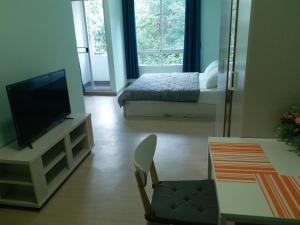 Televisyen dan/atau pusat hiburan di DD Garden Apartment 2