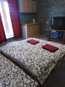 Postel nebo postele na pokoji v ubytování Гостевая комната