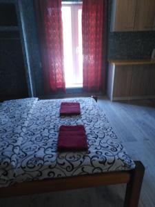 Postel nebo postele na pokoji v ubytování Гостевая комната