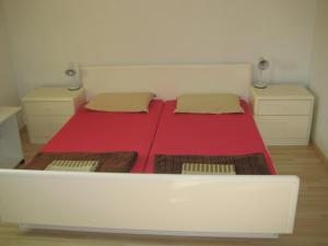 Postel nebo postele na pokoji v ubytování Marijan Martinović Apartments