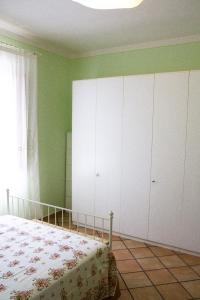 A bed or beds in a room at B&B Il Ramaiolo