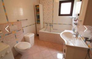 Kúpeľňa v ubytovaní Apartman San Marino 2