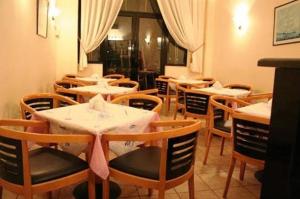 A restaurant or other place to eat at Aktaion City Hotel