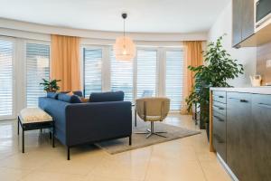 A kitchen or kitchenette at Apartman Balaton