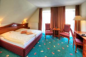 Postel nebo postele na pokoji v ubytování Hotel Freihof + 37 fotografií