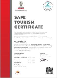 un catálogo de un certificado de turismo in situ en rojo y blanco en Club Sidar Apart Hotel, en Alanya