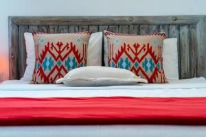 Postel nebo postele na pokoji v ubytování Mosso Boutique Hotel