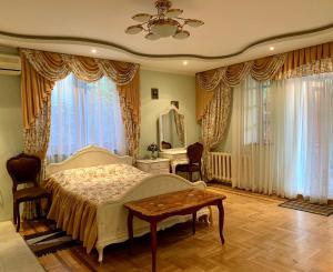 Tempat tidur dalam kamar di Guest House na Pribrezhnoy