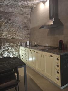 Ett kök eller pentry på Casa Cueva Un Rincón en la Roca