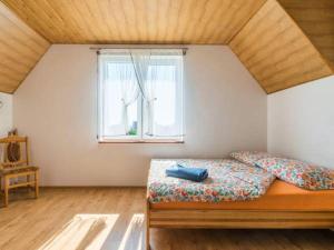 Un pat sau paturi într-o cameră la Kwatery prywatne Monika i Artur Lamczyk