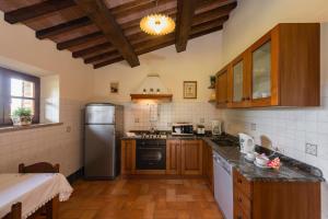 Kuchyň nebo kuchyňský kout v ubytování Agriturismo CaseGraziani