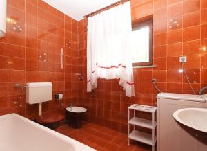 Kúpeľňa v ubytovaní Apartments Evelina 1057