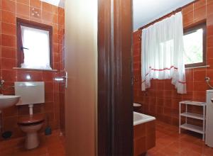 Kúpeľňa v ubytovaní Apartments Evelina 1057