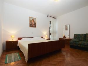 Posteľ alebo postele v izbe v ubytovaní Apartments Evelina 1057
