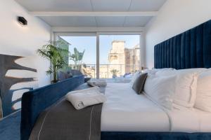 เตียงในห้องที่ U Collection - a Luxury Collection Suites, Valletta