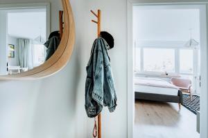 Posteľ alebo postele v izbe v ubytovaní Gdynia Square Apartment