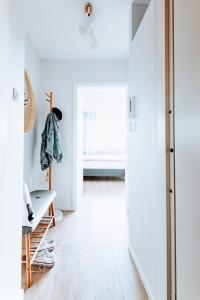 Posteľ alebo postele v izbe v ubytovaní Gdynia Square Apartment