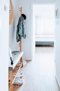 Posteľ alebo postele v izbe v ubytovaní Gdynia Square Apartment