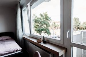 Posteľ alebo postele v izbe v ubytovaní Gdynia Square Apartment