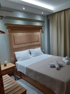 Posteľ alebo postele v izbe v ubytovaní ONAR by the sea Luxurious Apartments