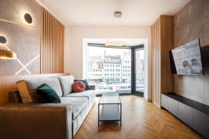 Posteľ alebo postele v izbe v ubytovaní Apartament DEO PLAZA
