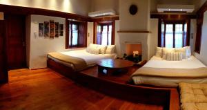 Postel nebo postele na pokoji v ubytování Astraka Guesthouse I