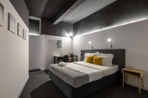 Posteľ alebo postele v izbe v ubytovaní Hotel Bohemian Garni - Skadarlija