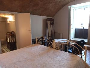 Tempat tidur dalam kamar di Torretta ai Sassi