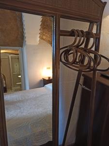Tempat tidur dalam kamar di Torretta ai Sassi