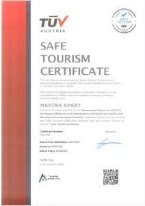 a sign for aire tourism certificate on aadobe at Marina Apart Hotel in Marmaris